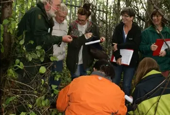 Volunteers learning new environmental surveying techniques