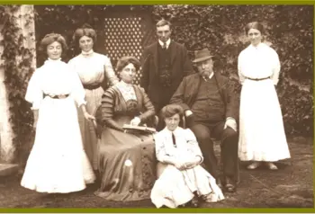 The Caldwell family posed outside a building c.1908
