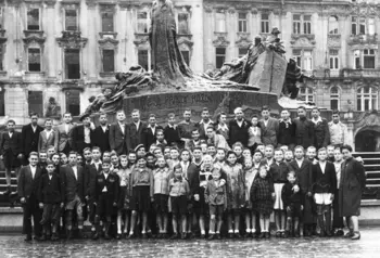 A black-and-white photograph of children in Prague