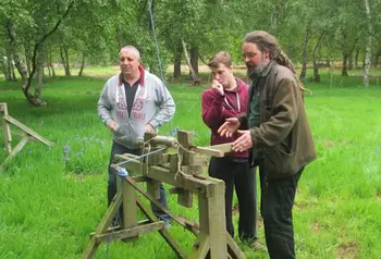 Young people learning about traditional building methods