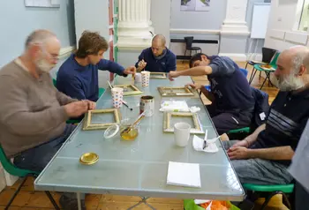 People learning how to gild