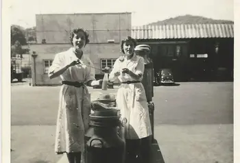 Black-and-white photograph of women factory workers
