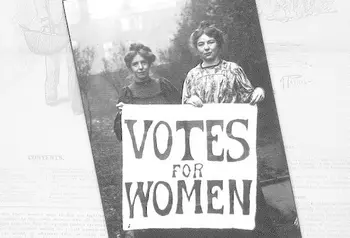 Suffragettes holding up a placard