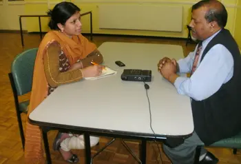 Adult volunteers conduct oral history interviews