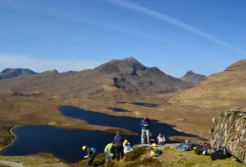 Volunteers learn more about the dramatic landscapes at Knockan Crag.