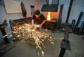 A trainee craftsperson at work