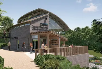 A mock-up of a wood clad building with step-free access