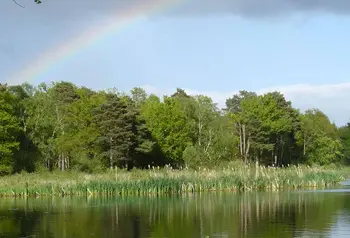 A rainbow shines over Stover Lake.