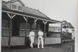 Black and white photo of two cricketeers