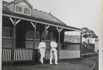 Black and white photo of two cricketeers