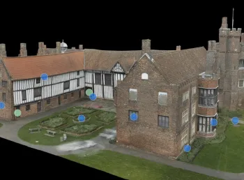 a digital 3D model of a historic timber-framed building