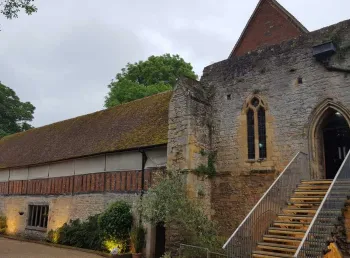 Abingdon Abbey building lit up at dusk