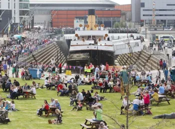 Crowds at an outdoor festival on Belfast's historic waterfront