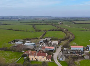 Aerial view of Ebdon Farm buildings and surrounding fields on the Somerset Levels