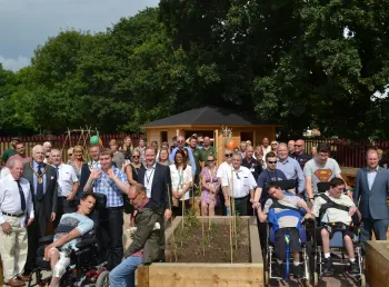 A large group of volunteer gardeners