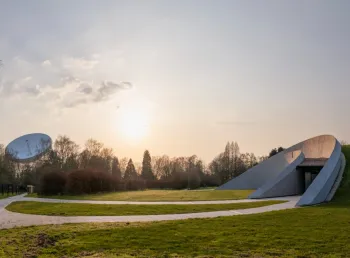The First Light Pavilion at Jodrell Bank (right had side) with the Lovell telescope in the background (left hand side)
