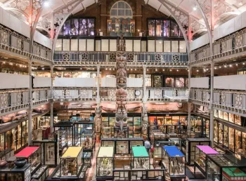A panoramic gallery view of the Pitt Rivers Museum