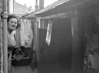 Historic photo of woman in street