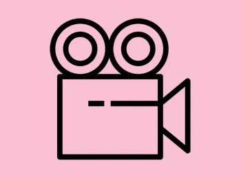A black icon showing a film projector