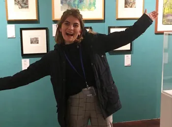 Young woman in a gallery