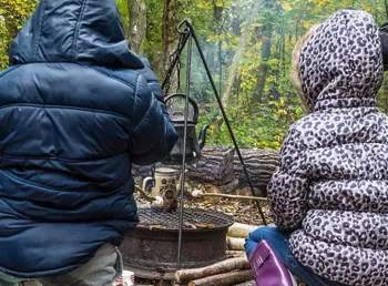 Children toasting marshmallows at a woodland storytelling festival