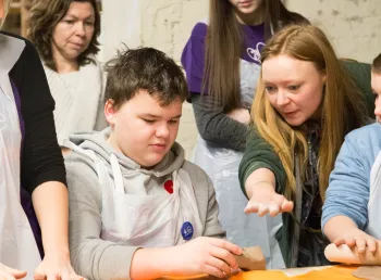 Children and adults take part in baking