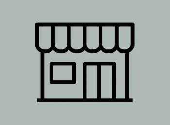 A block icon representing a shop