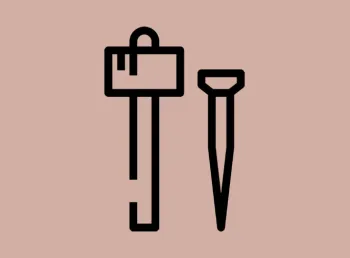Black icons of a nail and mallet, representing traditional heritage building skills
