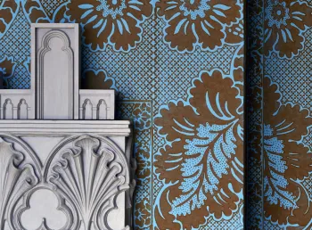 Wallpaper and fireplace in Mr Walpole's bedchamber