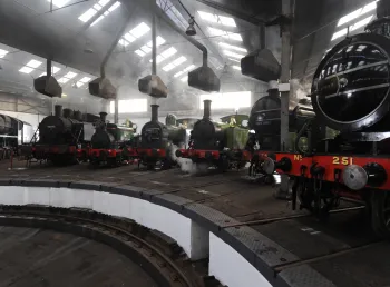 Locomotives line up inside the Barrow Hill Roundhouse
