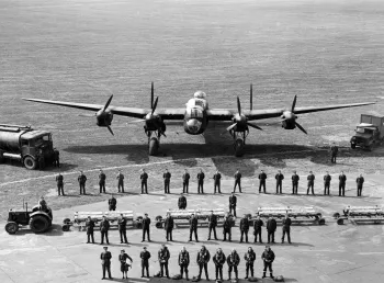 Units from Bomber Command line up in front of a Lancaster Bomber