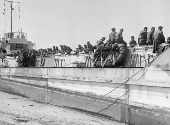 German prisoners await passage to England in a Landing Craft Tank