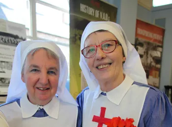 Anne Wall and Eileen Brereton in costume as First World War Red Cross nurses