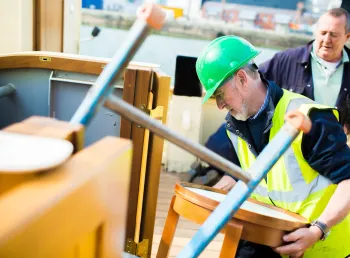 Volunteer Dave Lowles working on board the Daniel Adamson