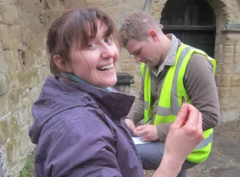 Volunteer with archaeological find at Abberley dig