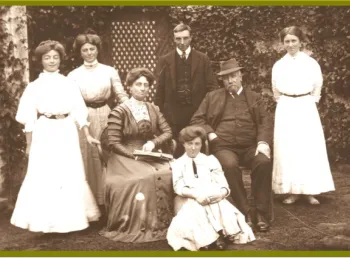 The Caldwell family posed outside a building c.1908