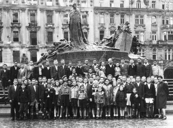 A black-and-white photograph of children in Prague