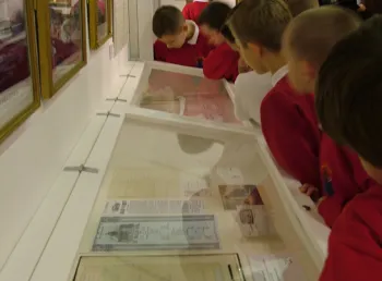 Children exploring an exhibition at Bury Art Museum