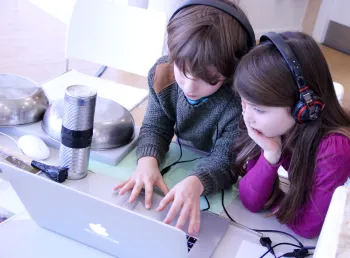 Children use a computer