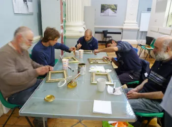 People learning how to gild
