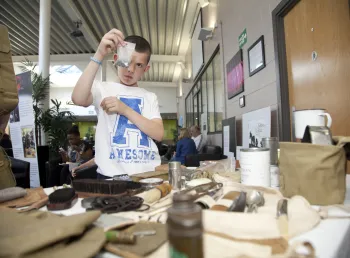 Examining some First World War artefacts at a community workshop