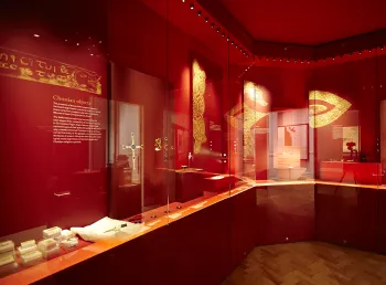 The Staffordshire Hoard Gallery with objects on display in glass cases