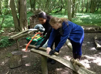Participants managing the woodland in Frithy Wood, Suffolk