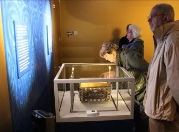 Visitors view the Lindisfarne Gospels