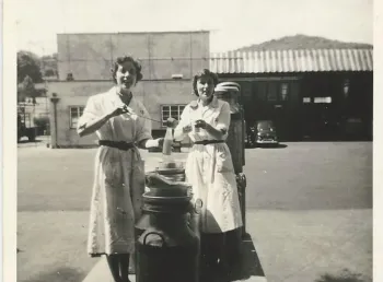 Black-and-white photograph of women factory workers