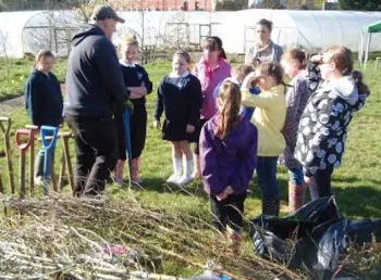 School children being taught about the importance of hedgerow