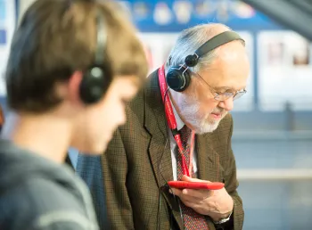Visitors listening to the audio tour at the John Galsworthy exhibition