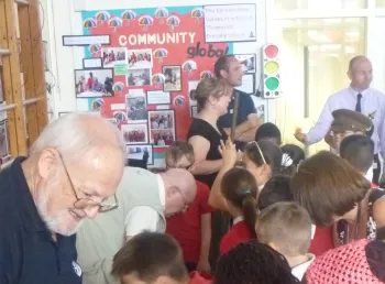 Volunteers from the Western Front Association share stories and artefacts with primary school children