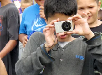 Young people taking photographs