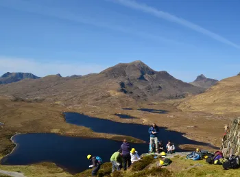 Volunteers learn more about the dramatic landscapes at Knockan Crag.
